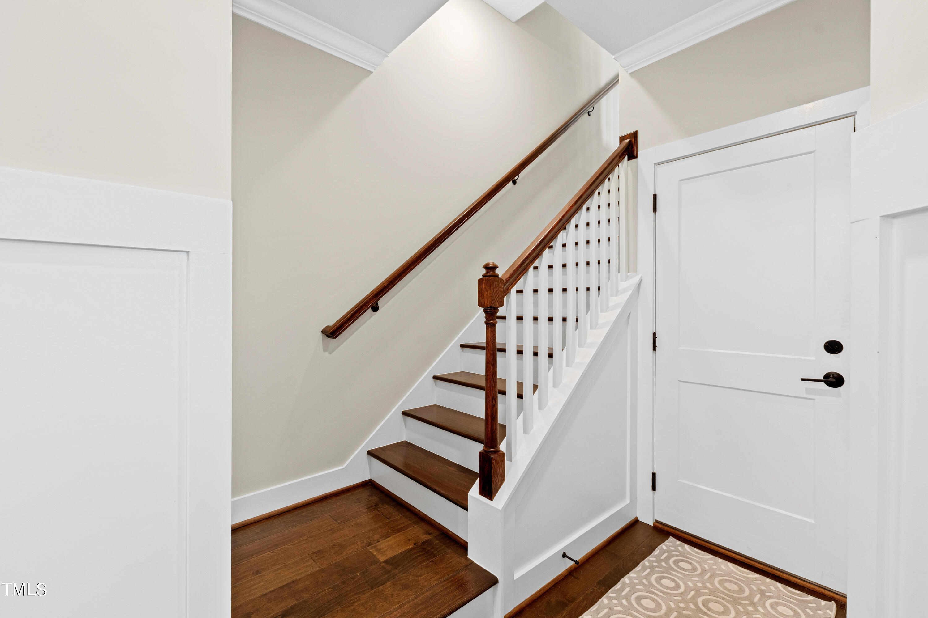 1610 Draper View Loop, Unit 106 Raleigh, NC 27608 - Photo 16 of 36 a view of entryway with stairs