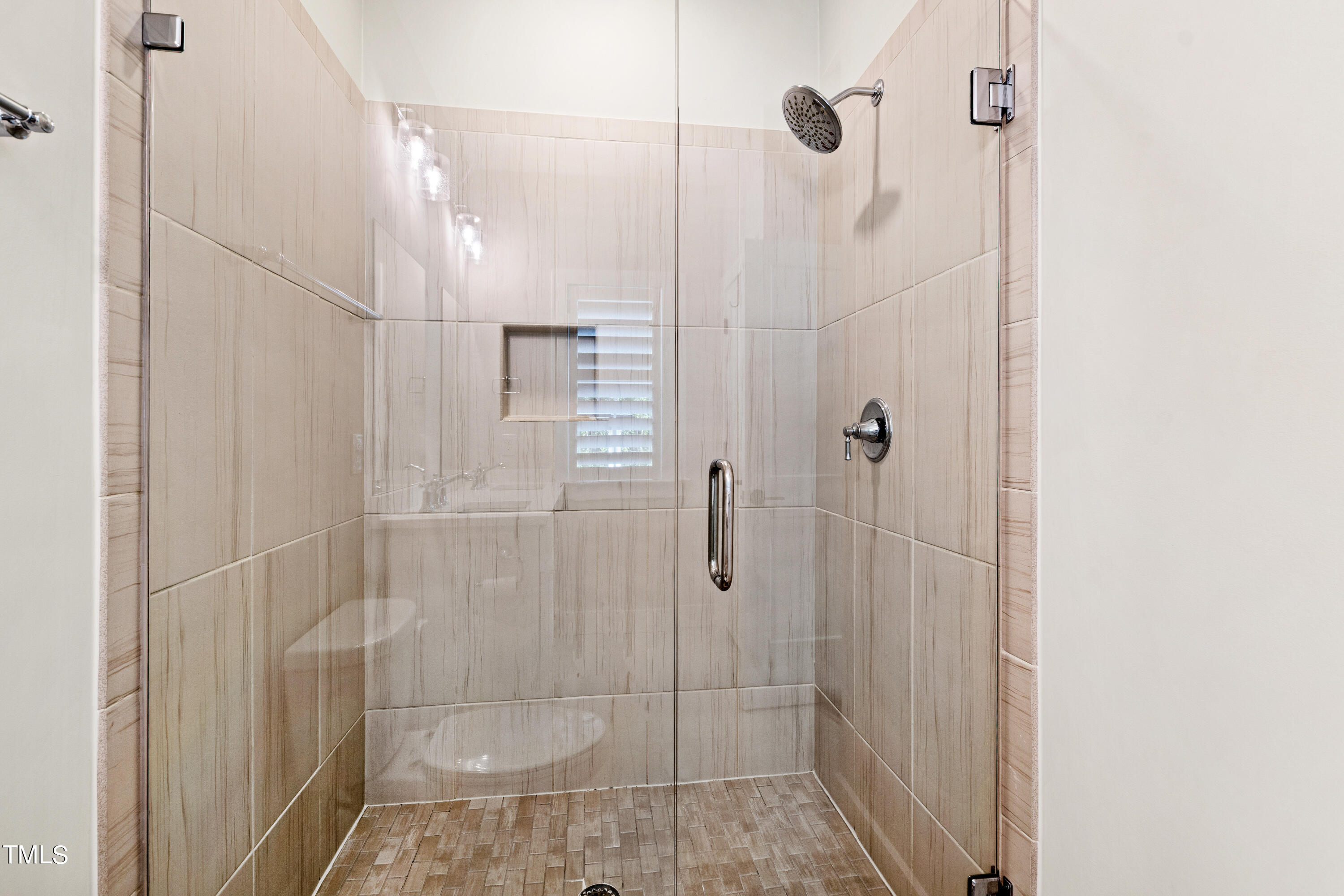 1610 Draper View Loop, Unit 106 Raleigh, NC 27608 - Photo 24 of 36 a bathroom with a shower