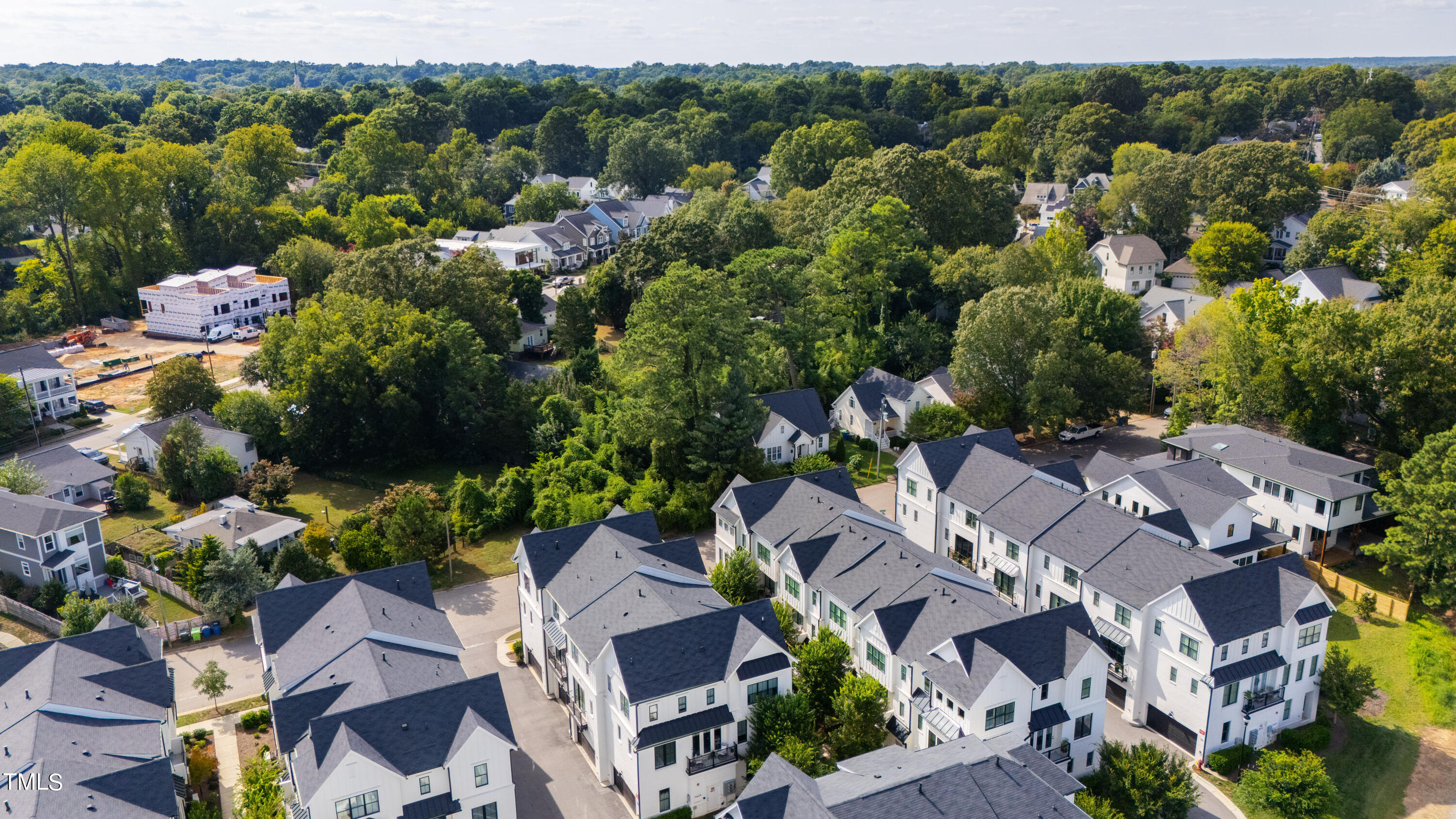 1610 Draper View Loop, Unit 106 Raleigh, NC 27608 - Photo 29 of 36 an aerial view of multiple house