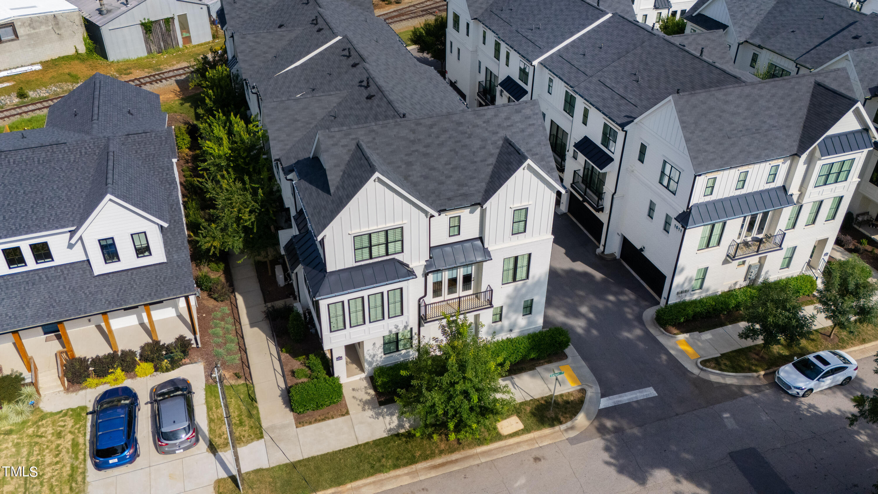 1610 Draper View Loop, Unit 106 Raleigh, NC 27608 - Photo 33 of 36 an aerial view of multiple houses