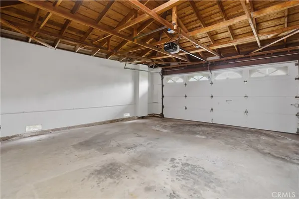a view of a room with wooden walls