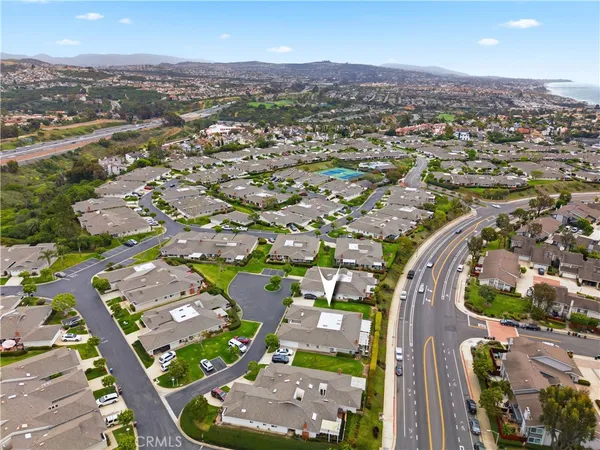 an aerial view of a city with lots of residential buildings