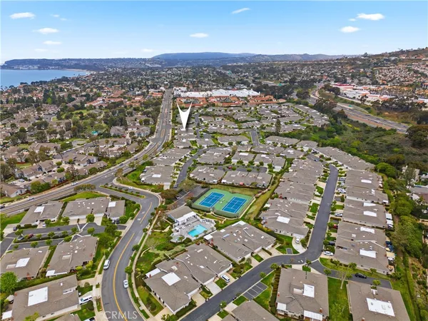 an aerial view of a city with lots of residential buildings