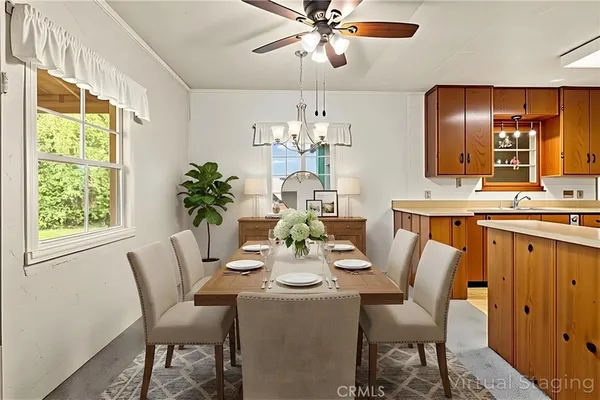 a kitchen with stainless steel appliances granite countertop a stove a refrigerator and a cabinets