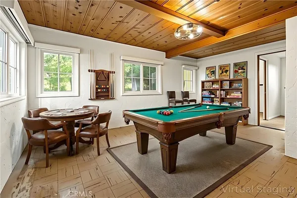 a bedroom with bed and a window