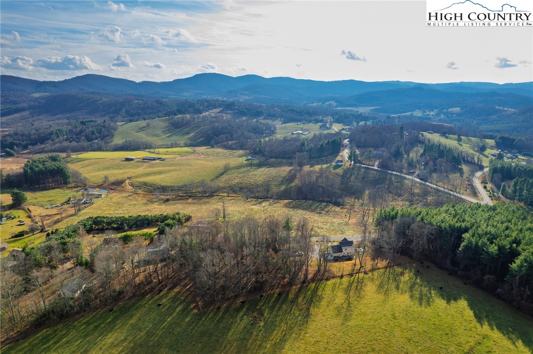 Tedder Road Sparta, NC 28675 - Photo 11 of 28 a view of an swimming pool with a yard