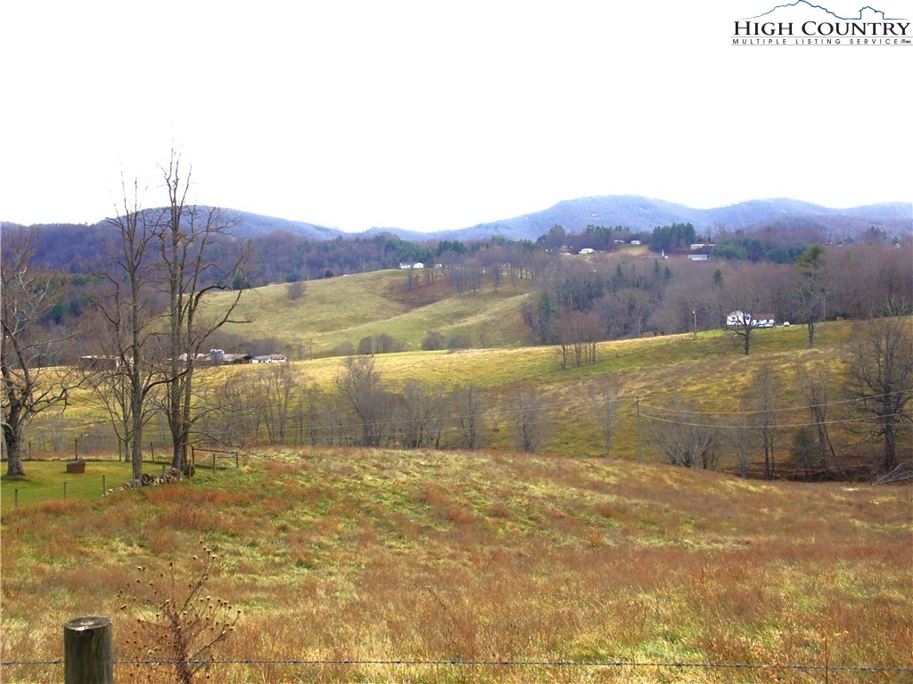 Tedder Road Sparta, NC 28675 - Photo 17 of 28 a view of a lake with mountains in the background