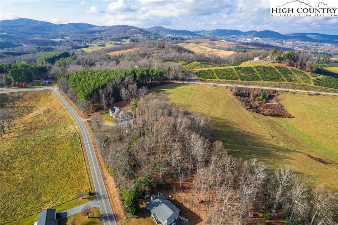 Tedder Road Sparta, NC 28675 - Photo 8 of 28 a view of a lake with a mountain