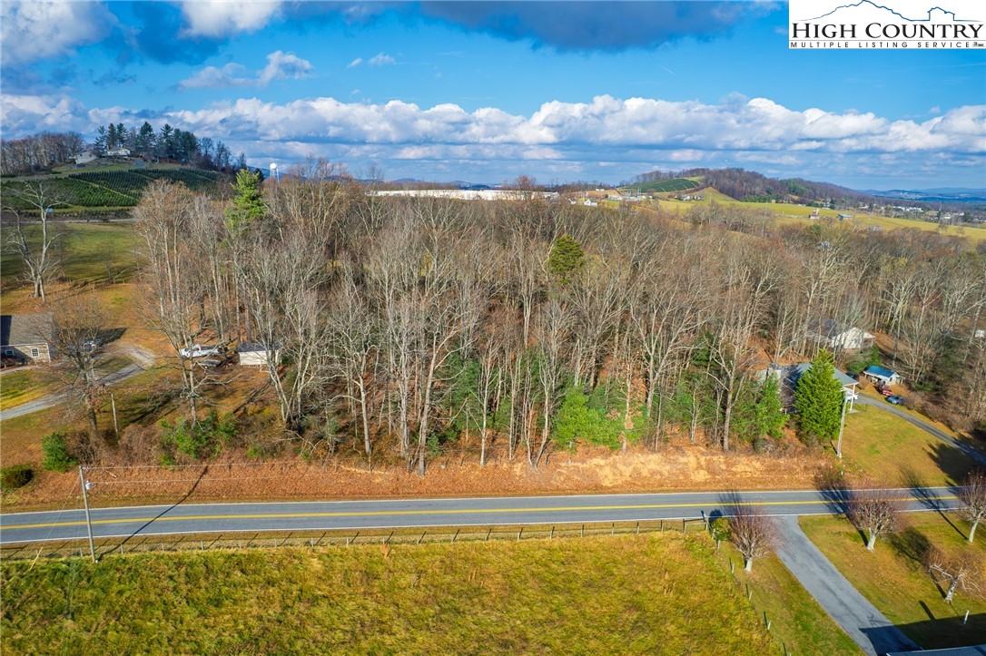 Tedder Road Sparta, NC 28675 - Photo 10 of 28 a view of swimming pool and mountain in the background