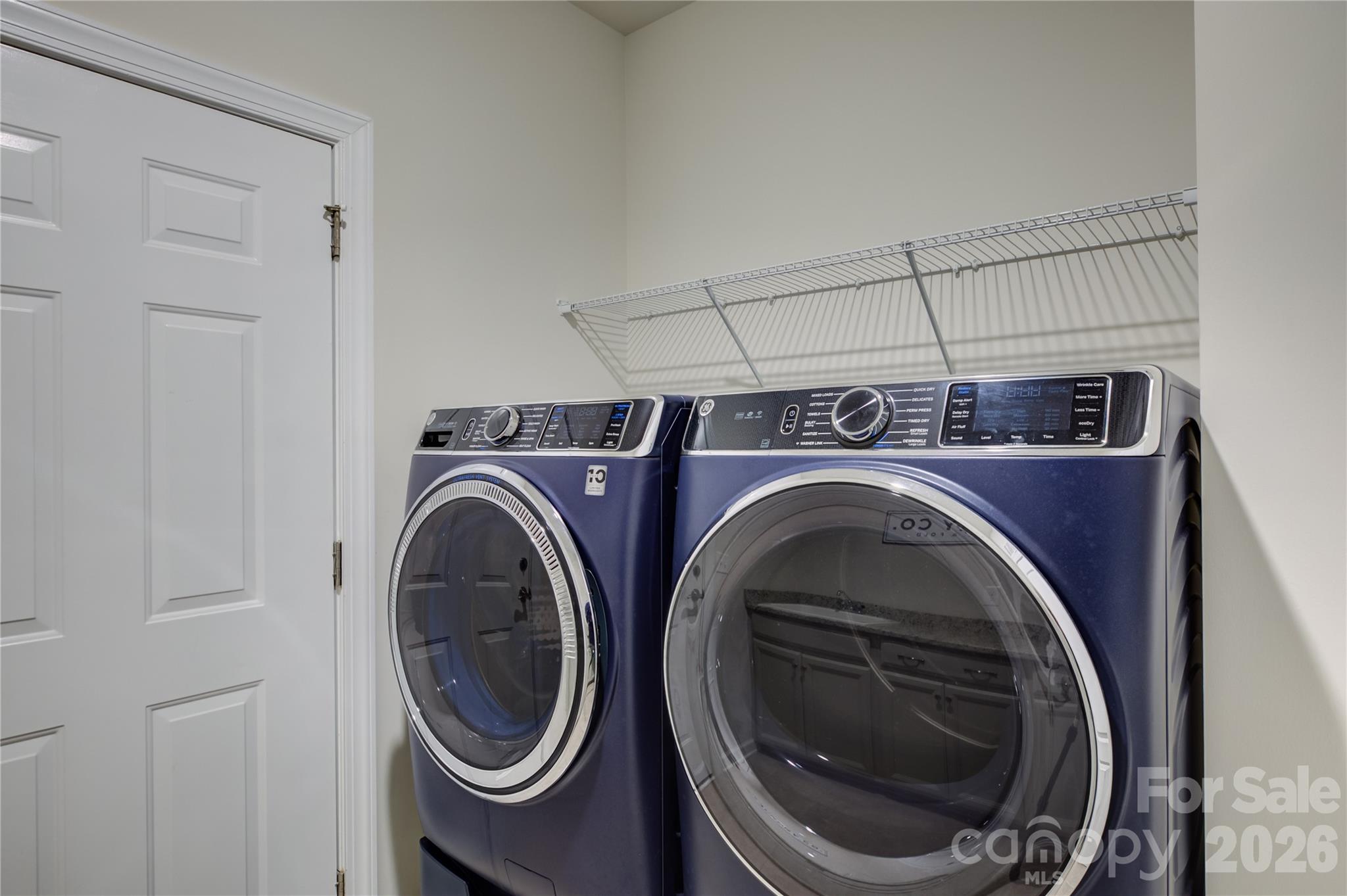 16541 Cozy Cove Road Charlotte, NC 28278 - Photo 26 of 47 a utility room with dryer and washer