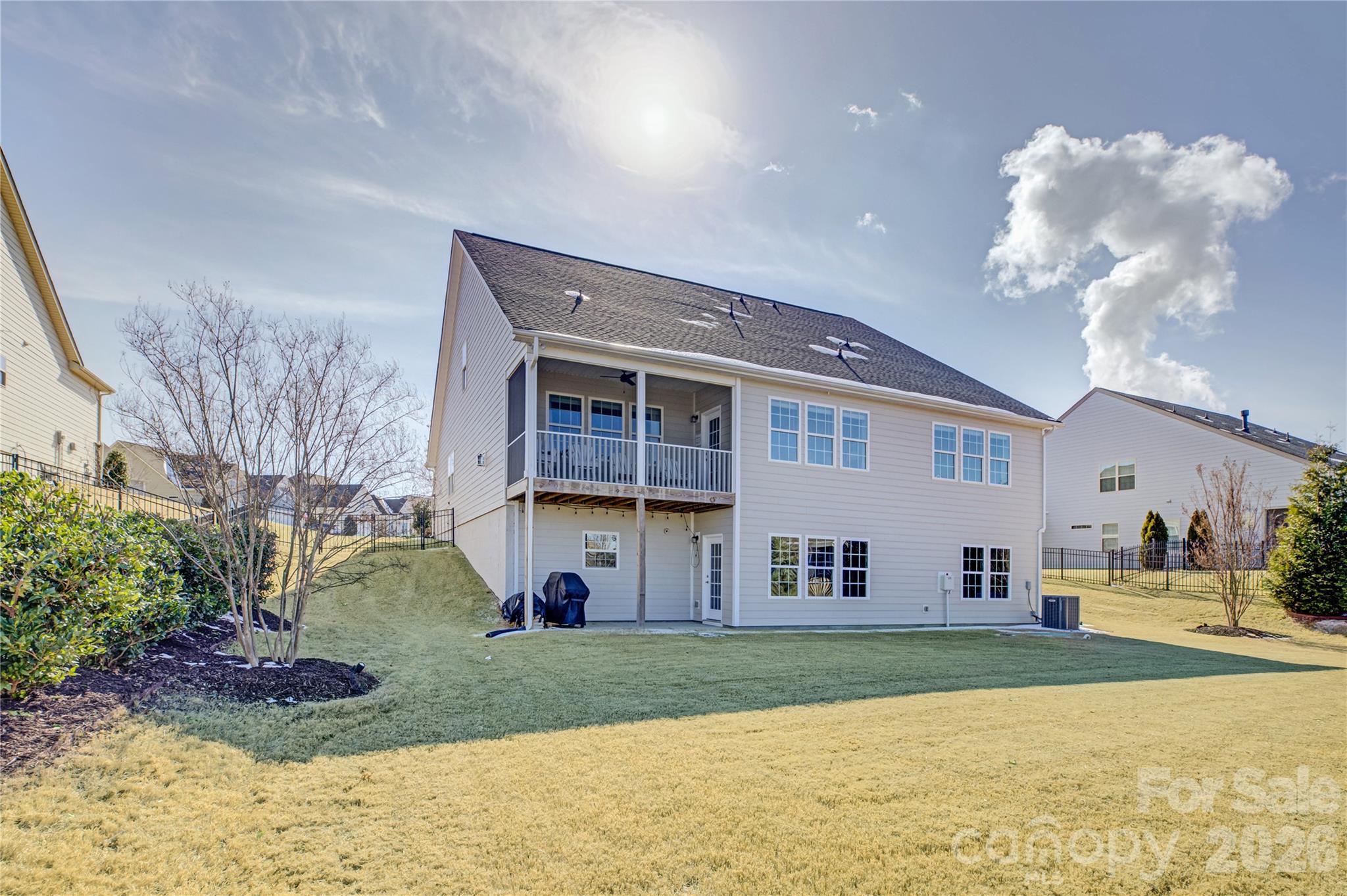 16541 Cozy Cove Road Charlotte, NC 28278 - Photo 40 of 47 a view of a house with a yard