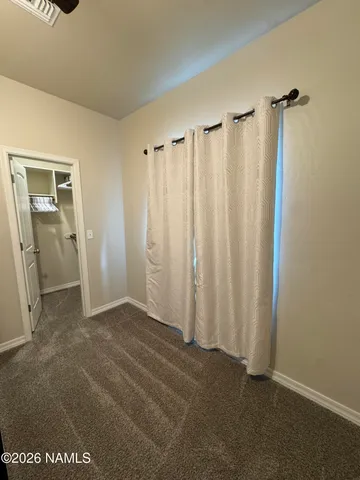 a view of a room with an entryway