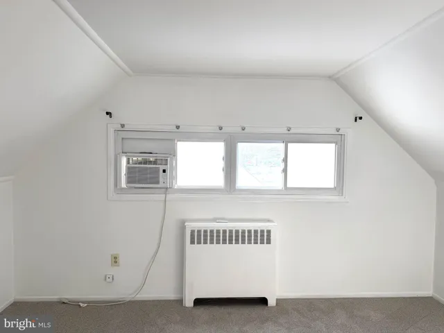 a view of a hallway with window