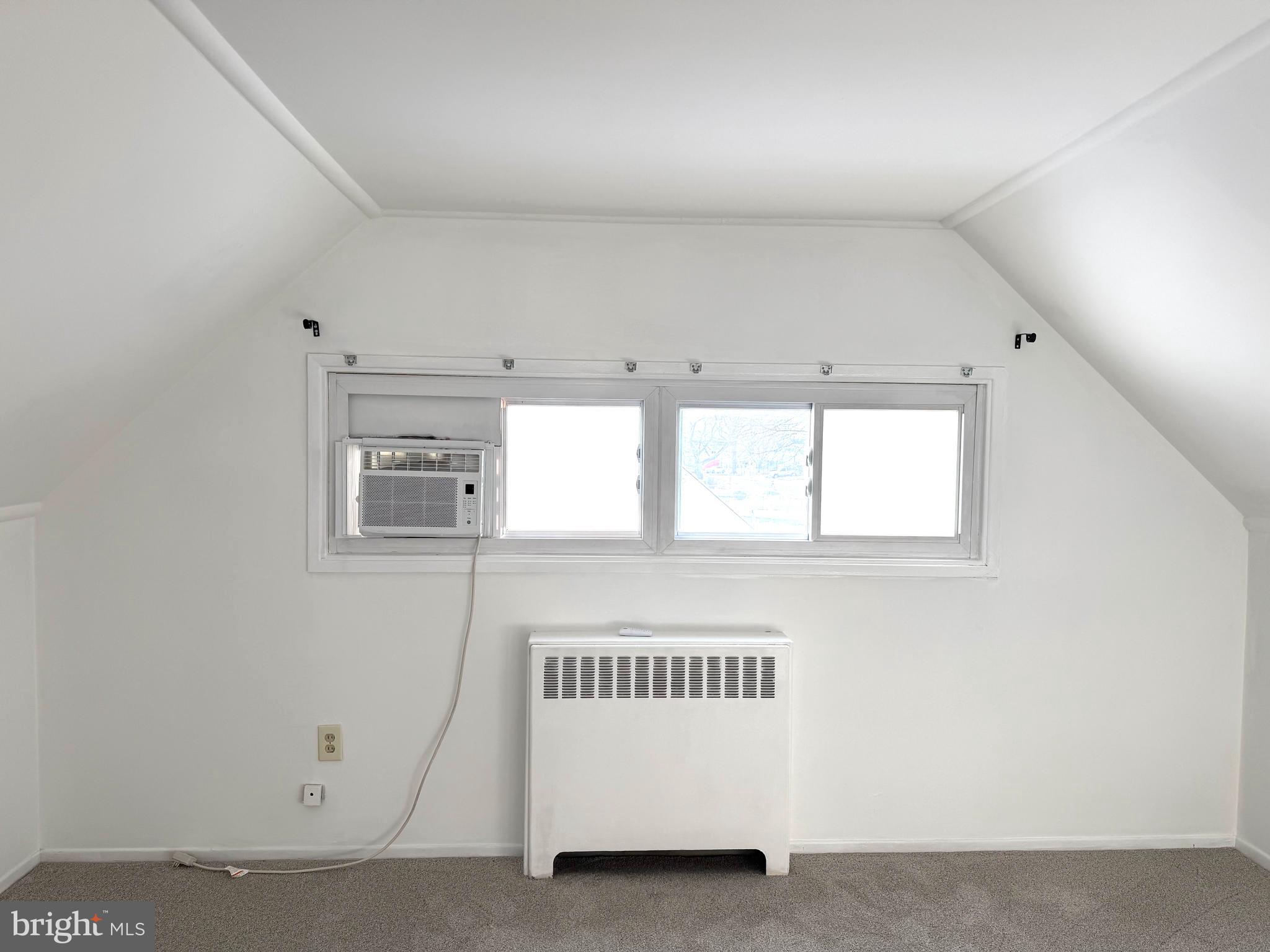 56 Indian Red Road Levittown, PA 19057 - Photo 14 of 19 a view of a hallway with window