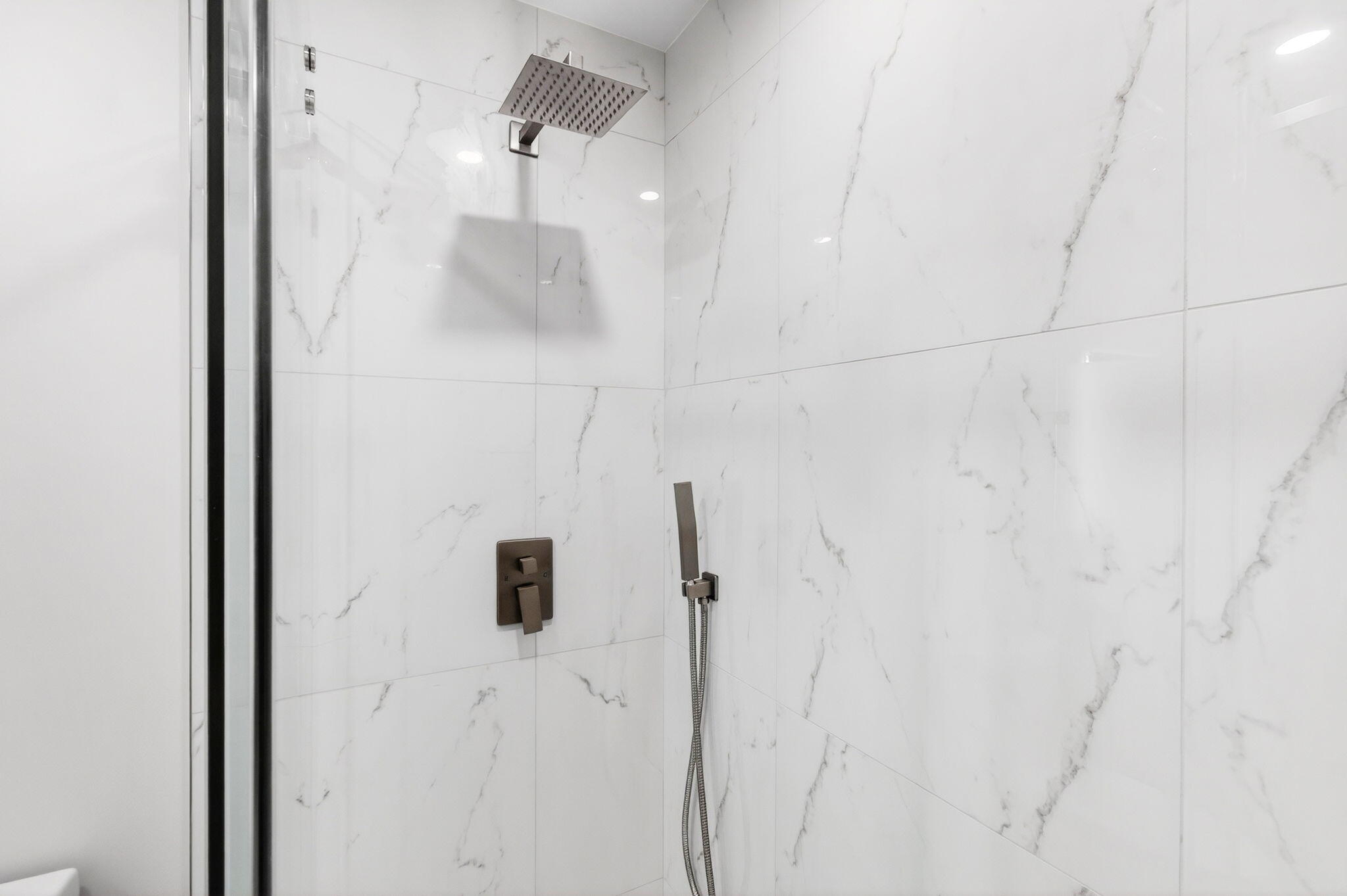 1330 Northwest 13th Street, Unit 12 Boca Raton, FL 33486 - Photo 29 of 52 a bathroom with a shower