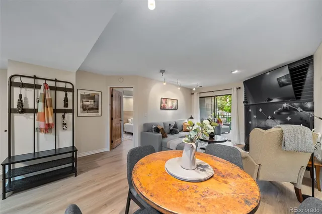 a kitchen with granite countertop a refrigerator and a stove