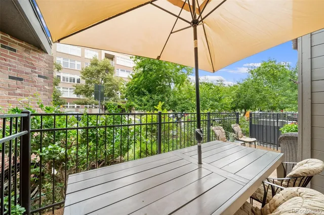a view of parking garage with cars