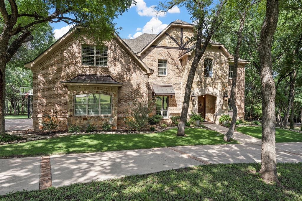 338 Estes Rch Road Bruceville, TX 76630 - Photo 2 of 40 a front view of a house with a yard