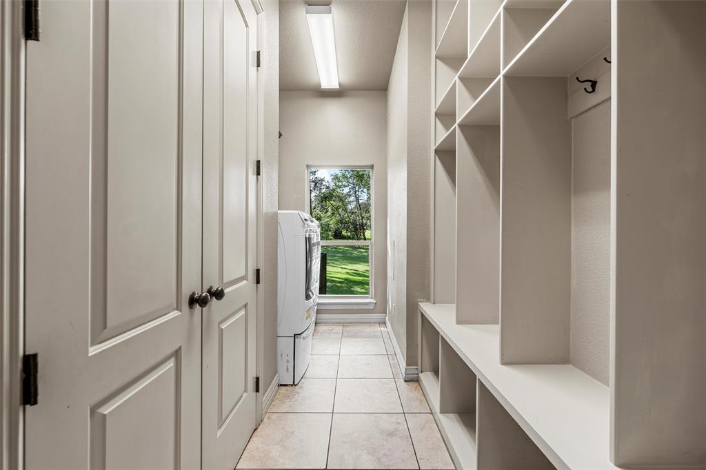 338 Estes Rch Road Bruceville, TX 76630 - Photo 24 of 40 a bathroom with a bathtub and shower
