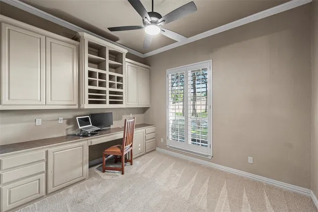 a workspace with furniture and windows