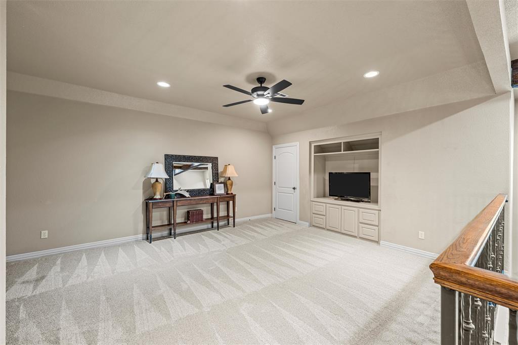 338 Estes Rch Road Bruceville, TX 76630 - Photo 28 of 40 a living room with furniture and a ceiling fan