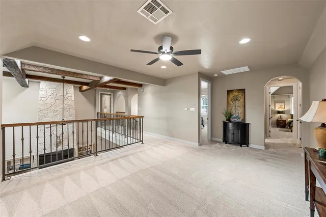 a en suite bathroom with double vanity and a mirror