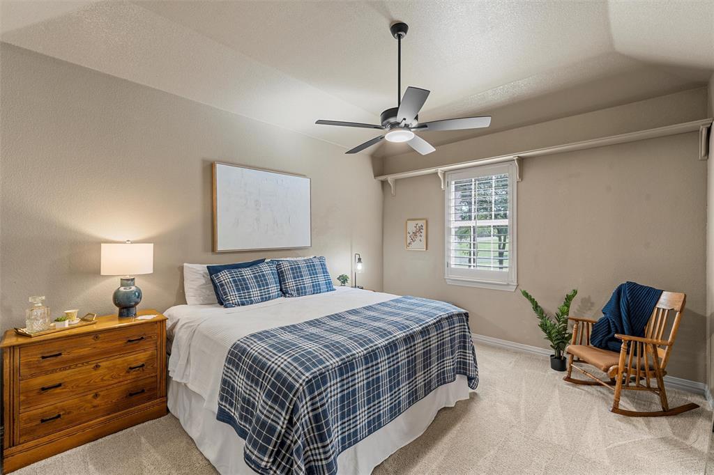 338 Estes Rch Road Bruceville, TX 76630 - Photo 31 of 40 a bedroom with a bed a chair and window