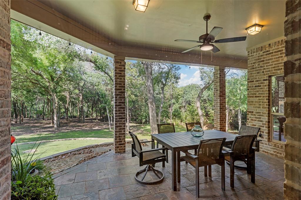 338 Estes Rch Road Bruceville, TX 76630 - Photo 5 of 40 a view of a dining room with furniture window and outside view