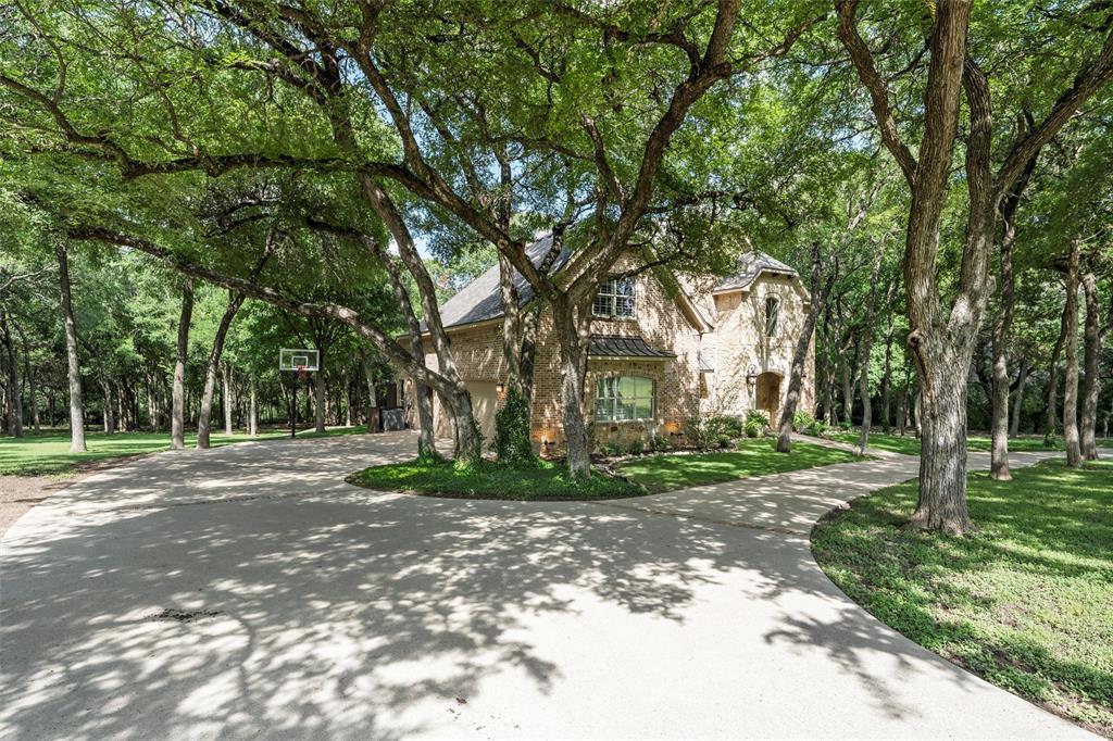 338 Estes Rch Road Bruceville, TX 76630 - Photo 6 of 40 a backyard of a house with lots of green space