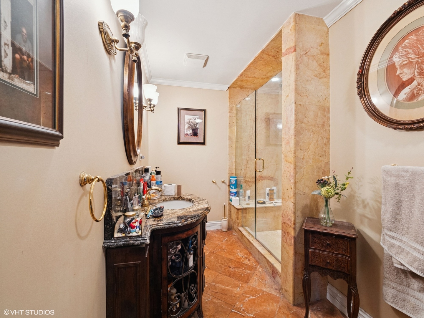 724 South Plum Grove Road Palatine, IL 60067 - Photo 18 of 37 a bathroom with a sink and a mirror