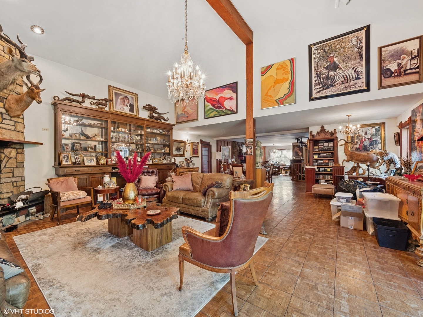 724 South Plum Grove Road Palatine, IL 60067 - Photo 3 of 37 a view of a living room filled with furniture and a chandelier