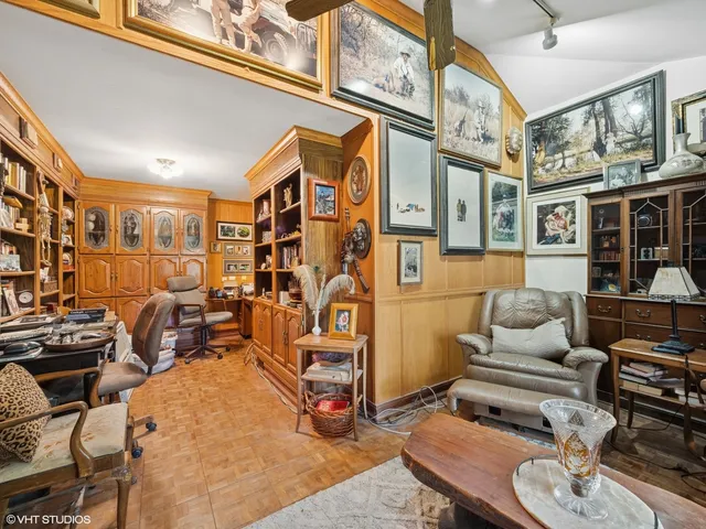 a living room with lots of furniture and a rug