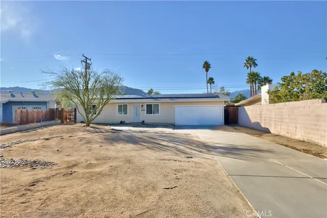 a view of a terrace with sitting area