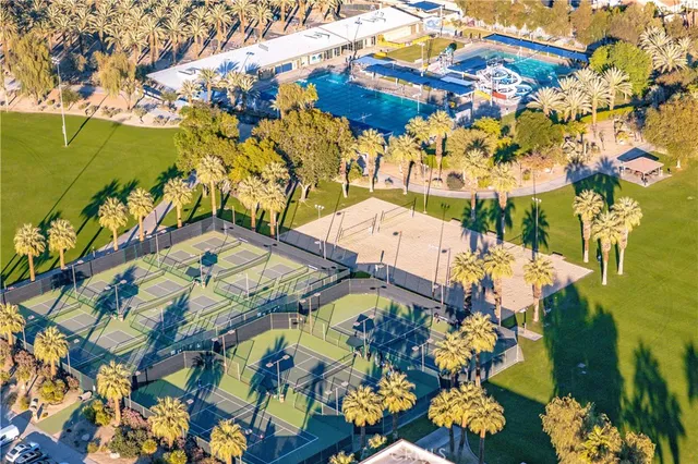 a view of a backyard with sitting area