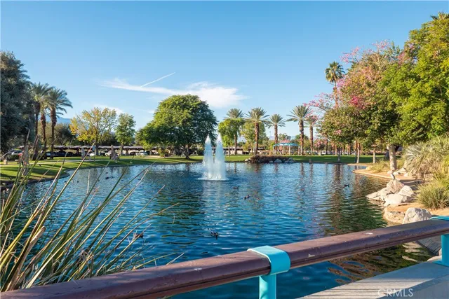 a view of swimming pool with a yard