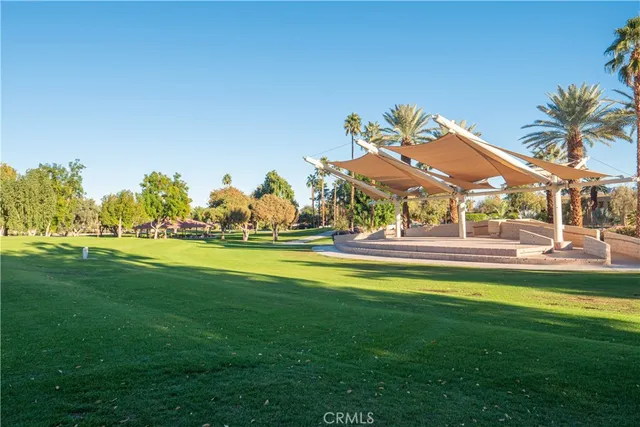 a view of a swimming pool and a garden