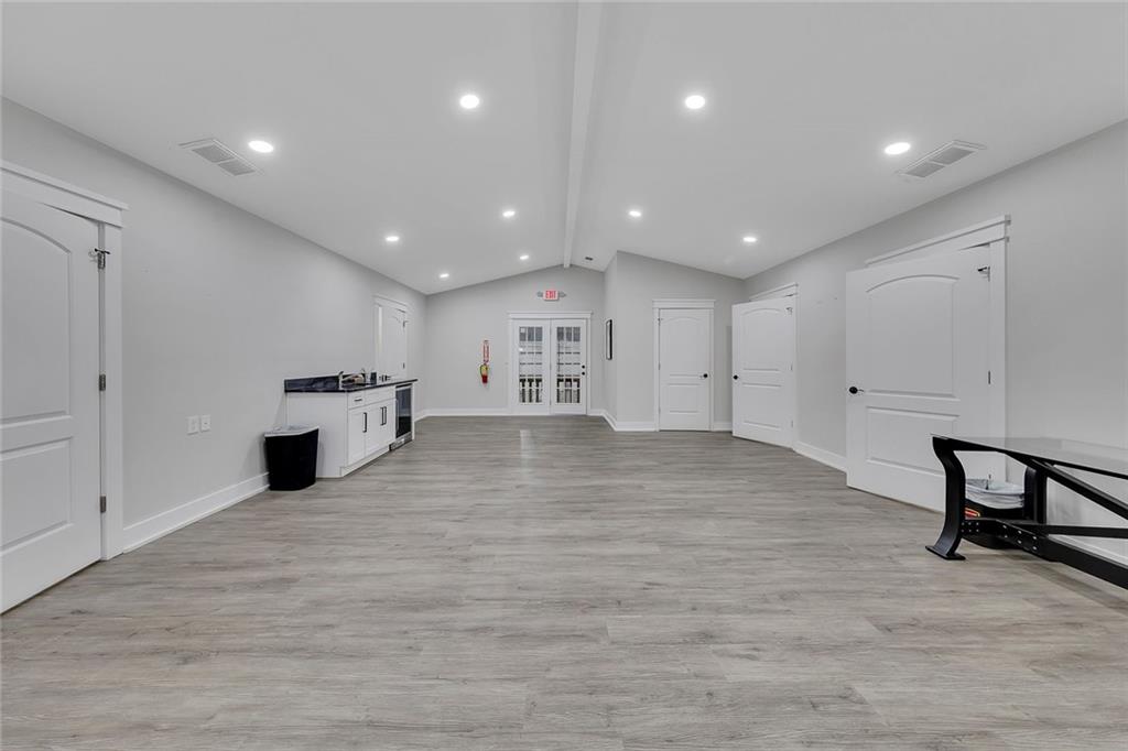 84 Lower Dowda Mill Road Jasper, GA 30143 - Photo 11 of 29 a view of a kitchen with furniture and wooden floor