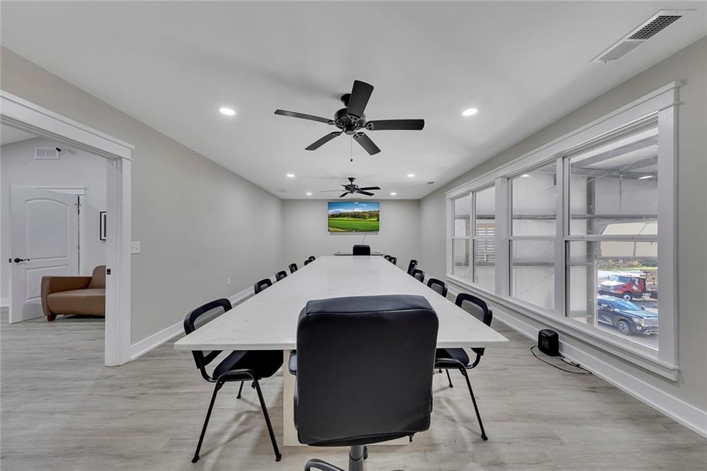 84 Lower Dowda Mill Road Jasper, GA 30143 - Photo 13 of 29 a view of a dining room with furniture window and wooden floor