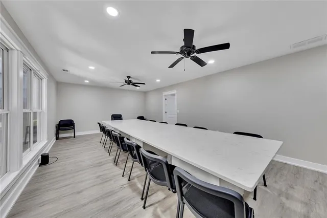 a view of a dining room with furniture