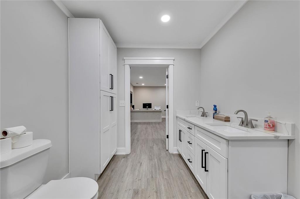 84 Lower Dowda Mill Road Jasper, GA 30143 - Photo 19 of 29 a bathroom with a sink toilet and shower