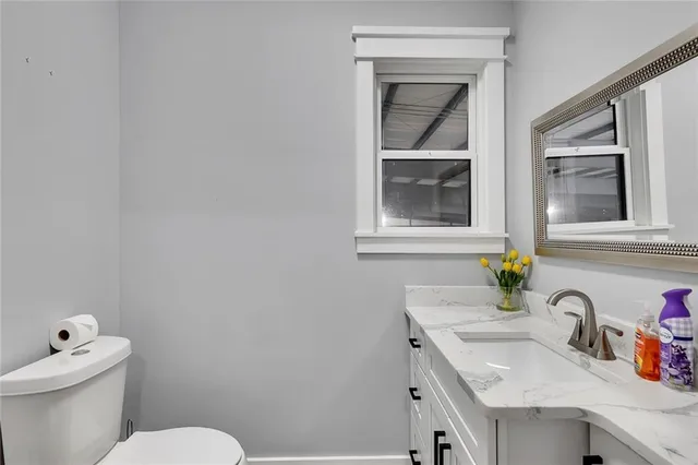 a bathroom with a sink and a toilet