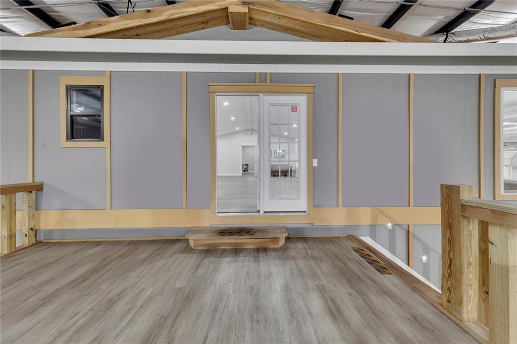 84 Lower Dowda Mill Road Jasper, GA 30143 - Photo 3 of 29 a view of a living room and hardwood floor