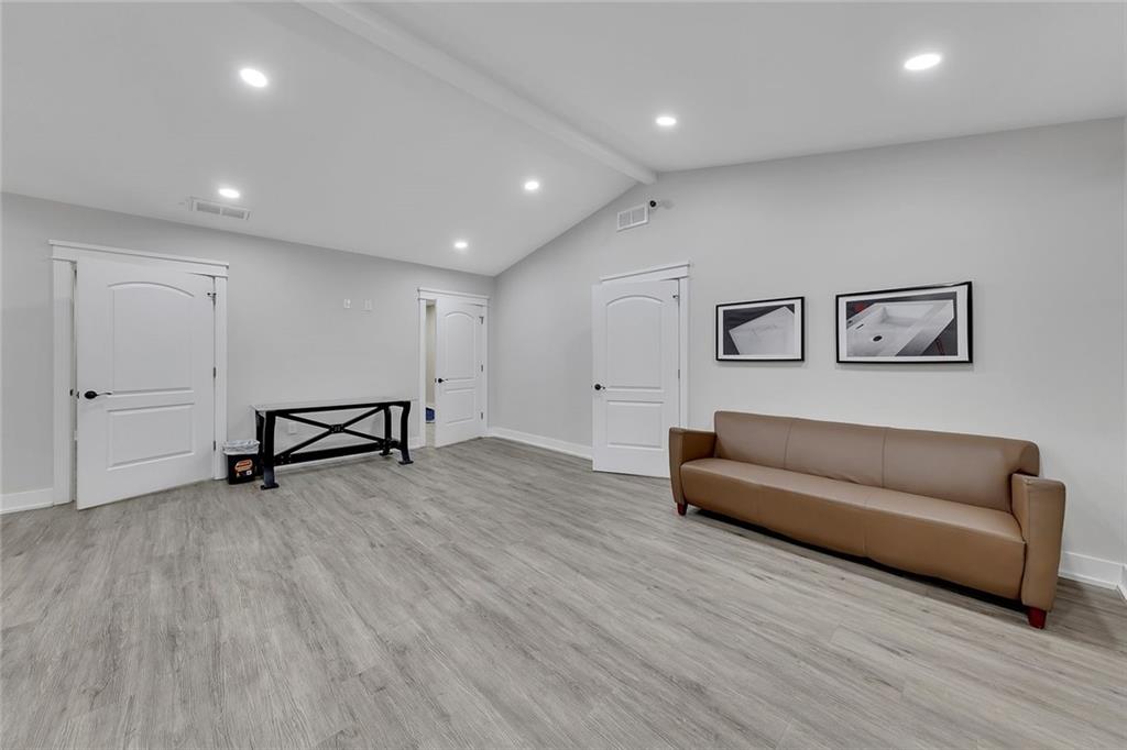 84 Lower Dowda Mill Road Jasper, GA 30143 - Photo 9 of 29 a view of a livingroom with furniture and wooden floor