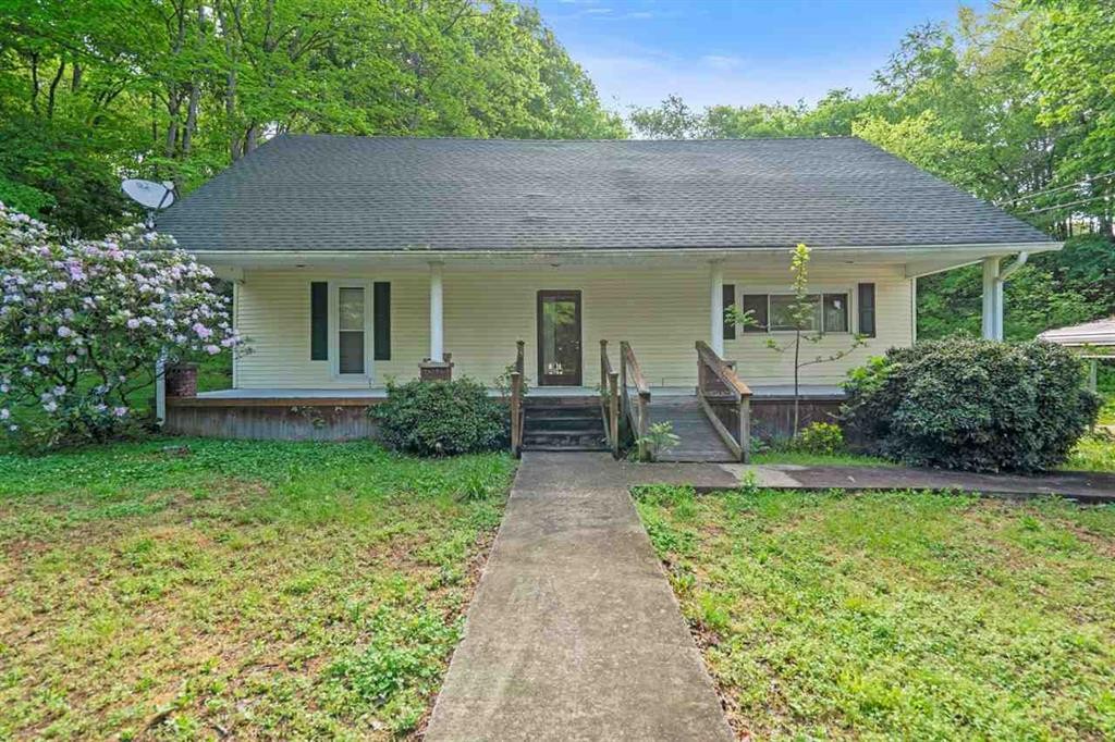 460 New Roe Road Franklin, KY 42134 - Photo 22 of 34 a front view of a house with garden