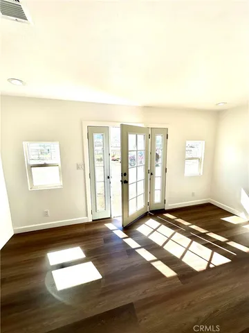 a view of an empty room and window