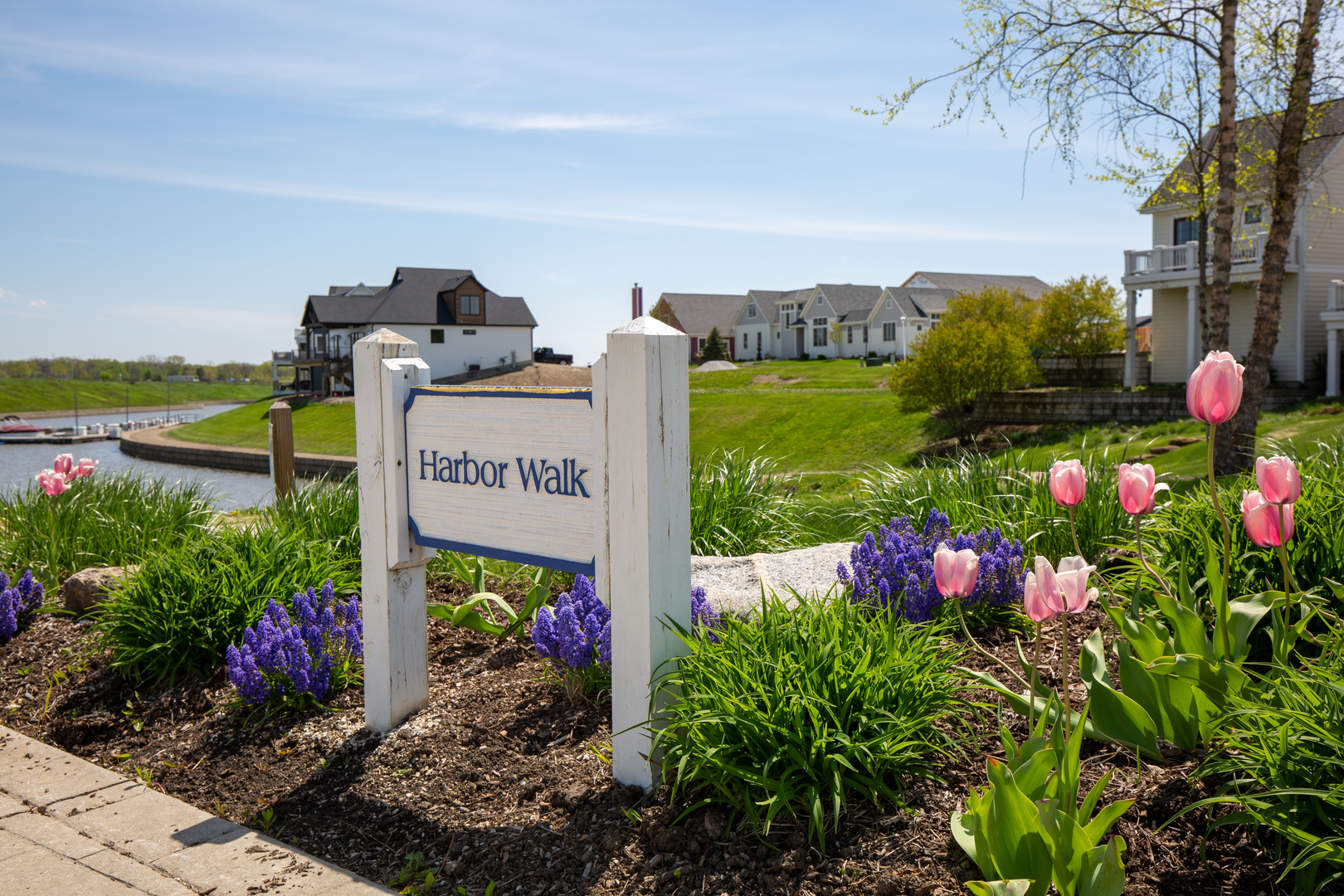 100 Great Loop E Drive, Unit 38 Ottawa, IL 61350 - Photo 14 of 15 a sign that is in front of flowers