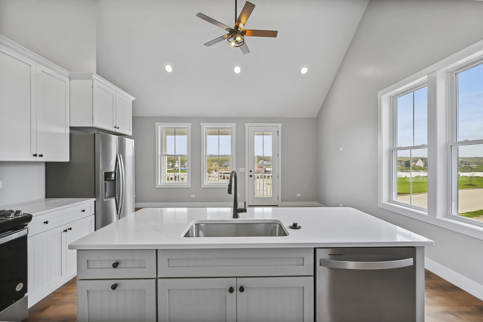 100 Great Loop E Drive, Unit 38 Ottawa, IL 61350 - Photo 7 of 15 a kitchen with a sink stainless steel appliances cabinets and a window