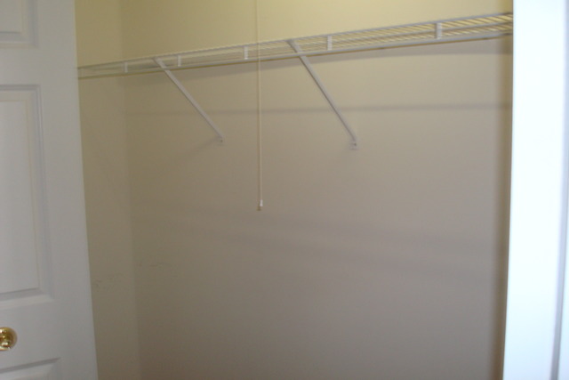 640 McHenry Road, Unit 2208 Wheeling, IL 60090 - Photo 14 of 17 a view of a rack on the wall
