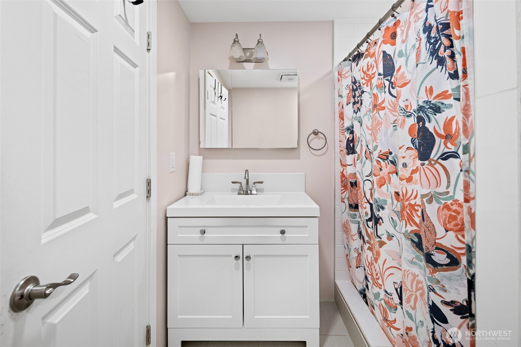 1645 South 272nd Street, Unit 13 Federal Way, WA 98003 - Photo 21 of 27 a bathroom with a sink and a mirror