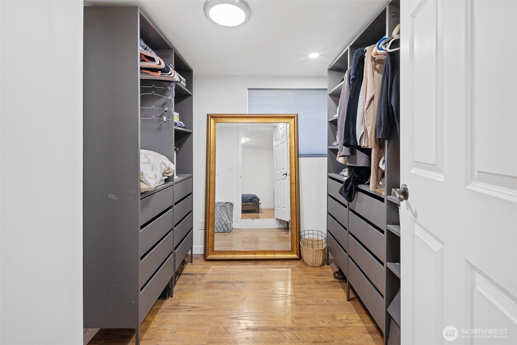 1645 South 272nd Street, Unit 13 Federal Way, WA 98003 - Photo 24 of 27 a view of walk in closet with clothes and shoes
